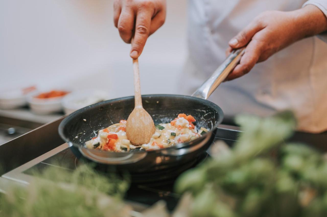 Grand Hotel Miramare Crikvenica Buitenkant foto A wooden spoon being used in a pan